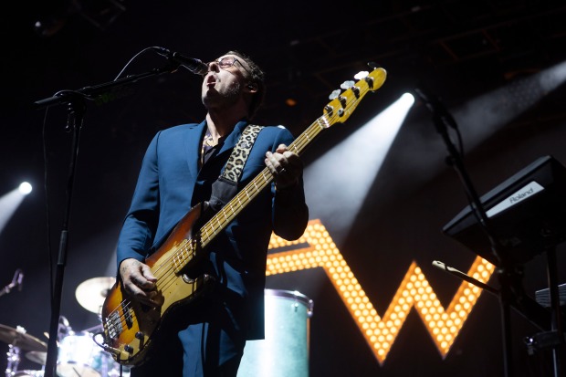 Scott Shriner of Weezer performs on day one of the...