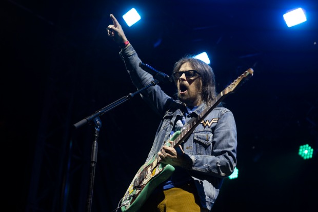 Rivers Cuomo of the band Weezer performs during day one...