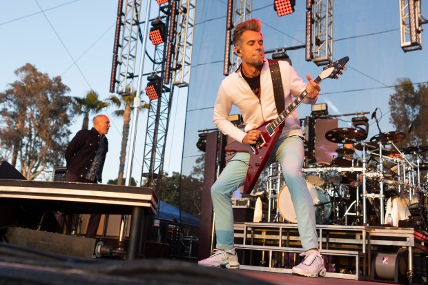 Nick Hexum of the band 311 performs during day one...