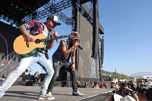 Country music duo LoCash (Chris Lucas, right, and Preston Brust,...