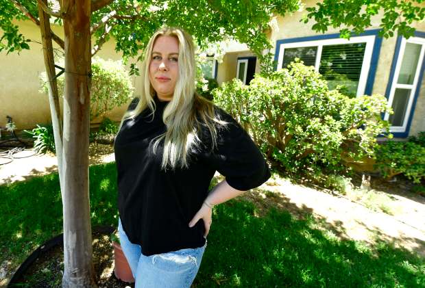 Brittney Dales, 28, has been living with her parents in San Bernardino since college to save for a home. But units that were just above her price range a few years ago now are more than $100,000 above what she can afford to pay. "I'd have to make double my income (to afford a home). So, like, roomie, marriage, any of those options obviously make that more feasible." (Photo by Will Lester, Inland Valley Daily Bulletin/SCNG)