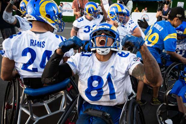 LA Rams' Malcolm Wright celebrates with his team after they won the USA Wheelchair Football League Tournament in Los Angeles on Wednesday, February 9, 2022 after defeating the Kansas City Chiefs 27-15. (Photo by Sarah Reingewirtz, Los Angeles Daily News/SCNG)