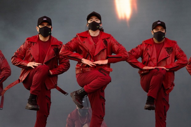 The Kinjaz dance crew performs on the main stage of...